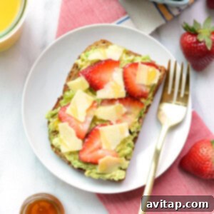 Avocado toast with strawberries and guacamole.