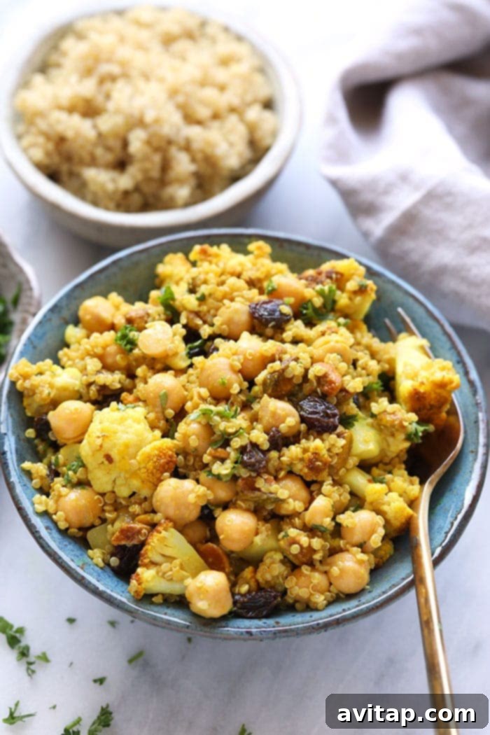 Golden Roasted Cauliflower and Quinoa Salad in a serving bowl.