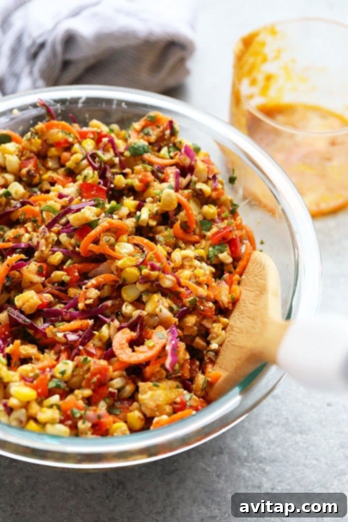 This Thai Chili Corn Salad is the perfect side dish for any time of year! It is a healthy side dish that is packed with flavor. You can prep your corn on the grill or on the stove and add it to the rest of the veggie-packed salad. You just can’t beat the Thai chili kick and all the veggies. Make a big bowl for dinner this week. Spicy vegan Thai chili corn salad, perfect side dish
