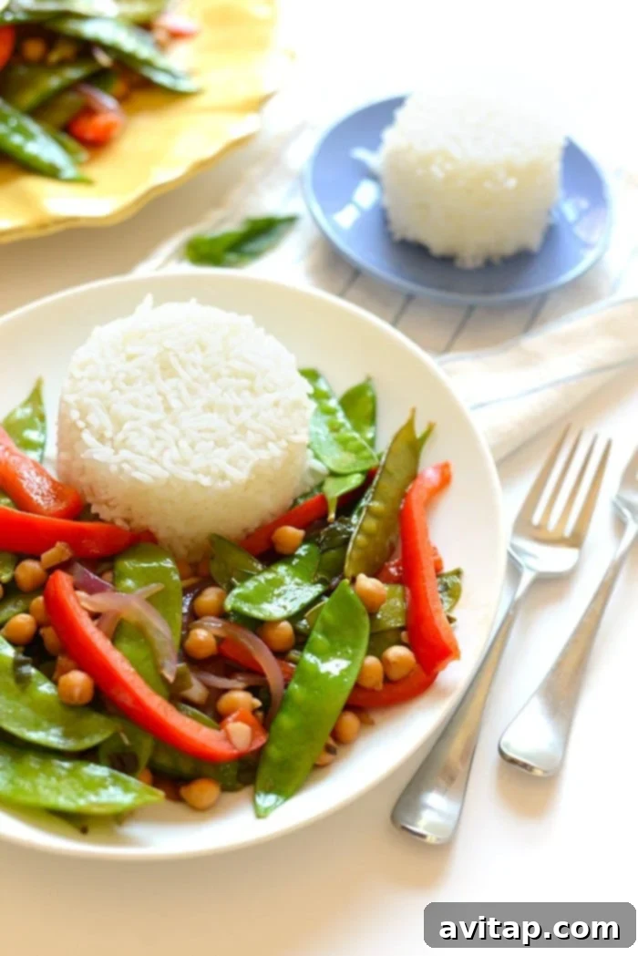 Ditch the meat and make yourself this delicious vegetarian Thai Basil Veggie Stir Fry with a side of sticky rice for a filling, fresh dinner! Flavorful vegan Thai basil veggie stir fry with sticky rice