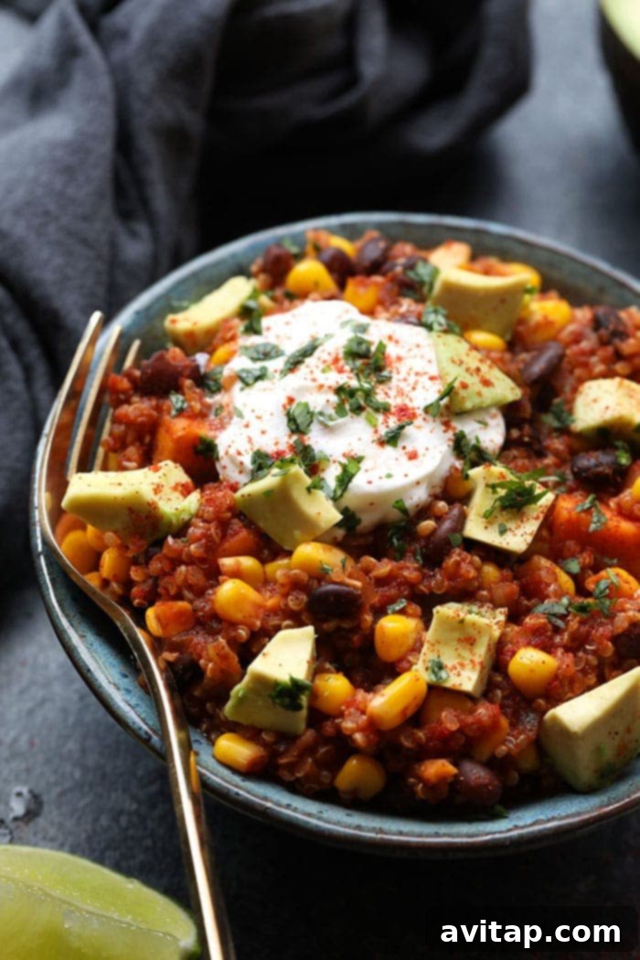This vegetarian slow cooker meal is so flavorful you won’t even miss the meat! Throw all of the ingredients for this Healthy Slow Cooker Sweet Potato Mexican Quinoa in your crock pot for an easy weeknight dinner that’s vegan, dairy-free, and gluten-free. Healthy vegan slow cooker sweet potato Mexican quinoa, gluten-free and dairy-free