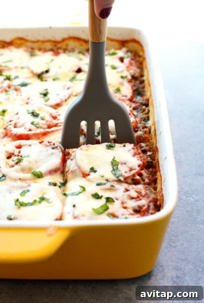 Slice of naked spinach quinoa lasagna casserole.