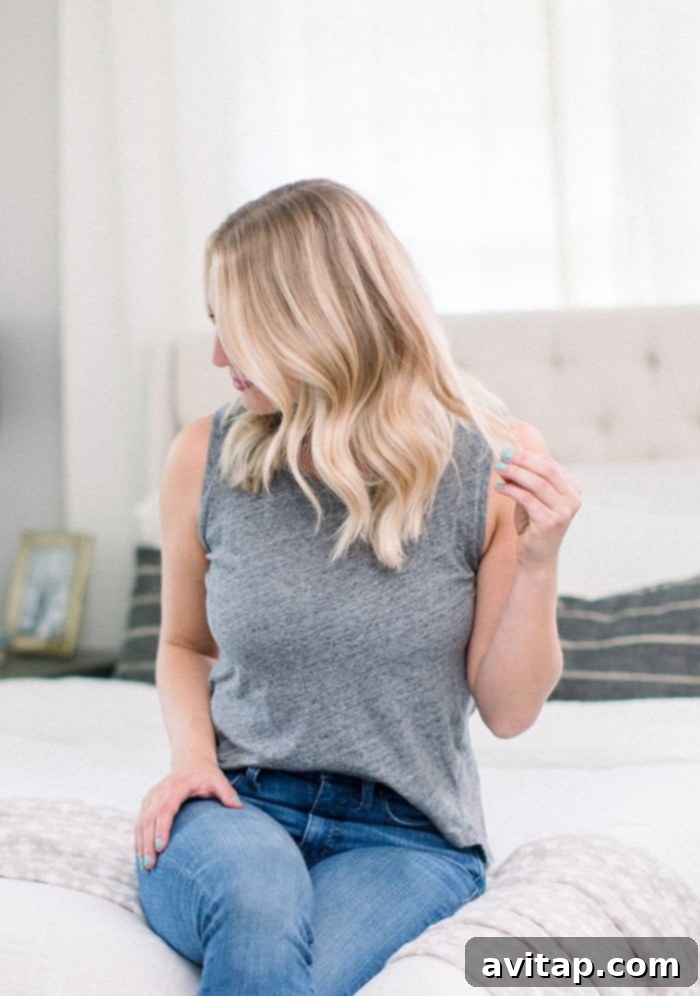 A side profile of the finished loose wave hairstyle, highlighting the flow and texture of the curls.