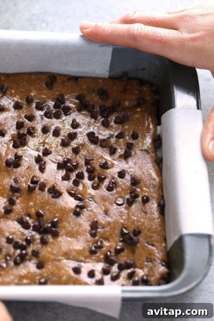 Close-up of freshly made peanut butter Larabars, showcasing their delicious texture.