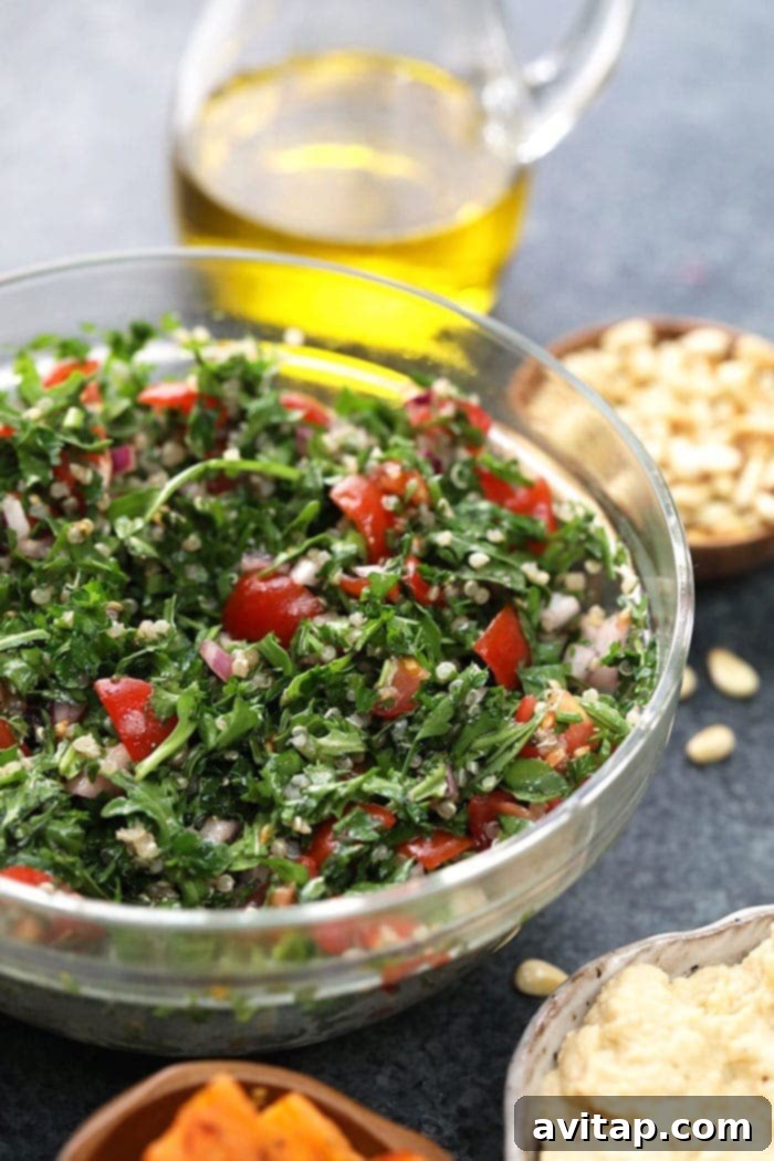 Refreshing Quinoa Tabouli, a key component of the Mediterranean Vegan Buddha Bowl, rich in herbs and protein.