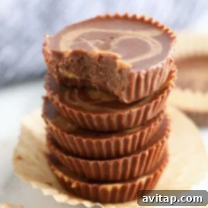 A decadent fat bomb recipe featuring peanut butter cups stacked high.