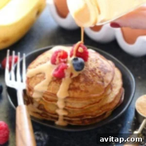 Photo of a stack of peanut flour pancakes, indicating a delicious and healthy meal option.