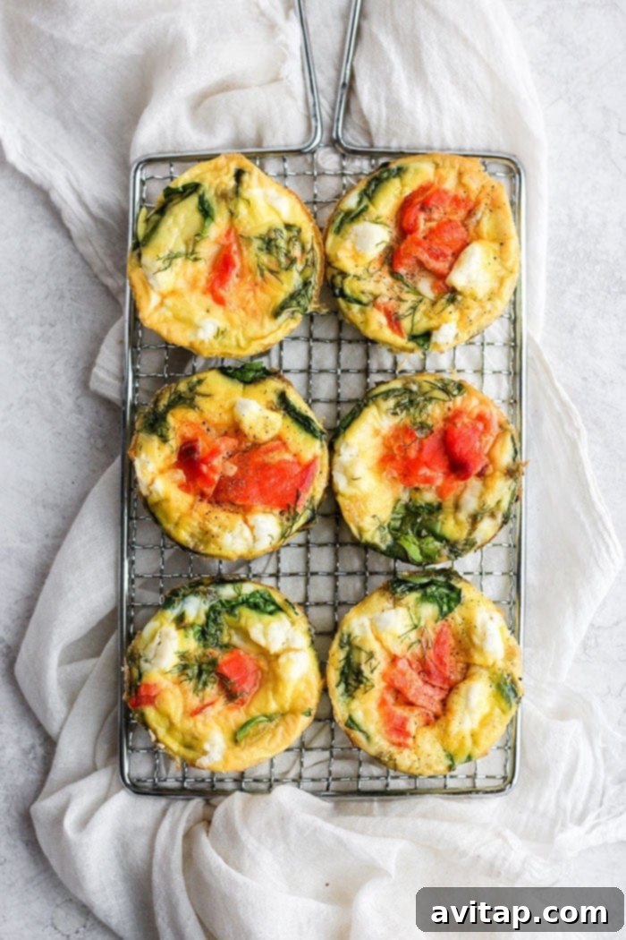 Individual smoked salmon breakfast frittatas served on a tray, ready to enjoy.