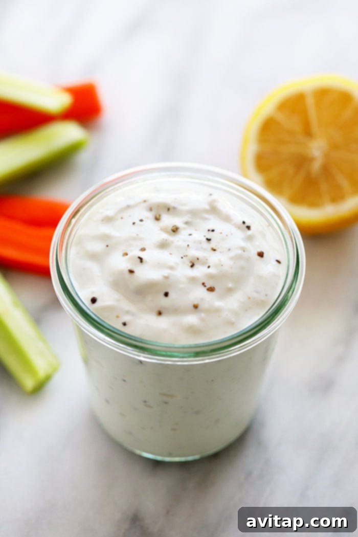 Creamy Greek yogurt blue cheese dressing in an elegant bowl, ready to be served with healthy meals.