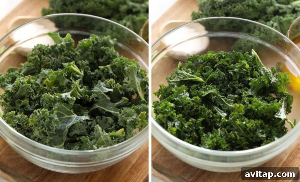 A vibrant bowl of fresh kale, ready to be massaged, showcasing its beautiful green leaves.