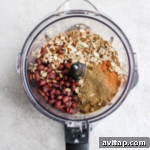 Savory Black Bean Burgers 4 A food processor filled with black bean burger ingredients.