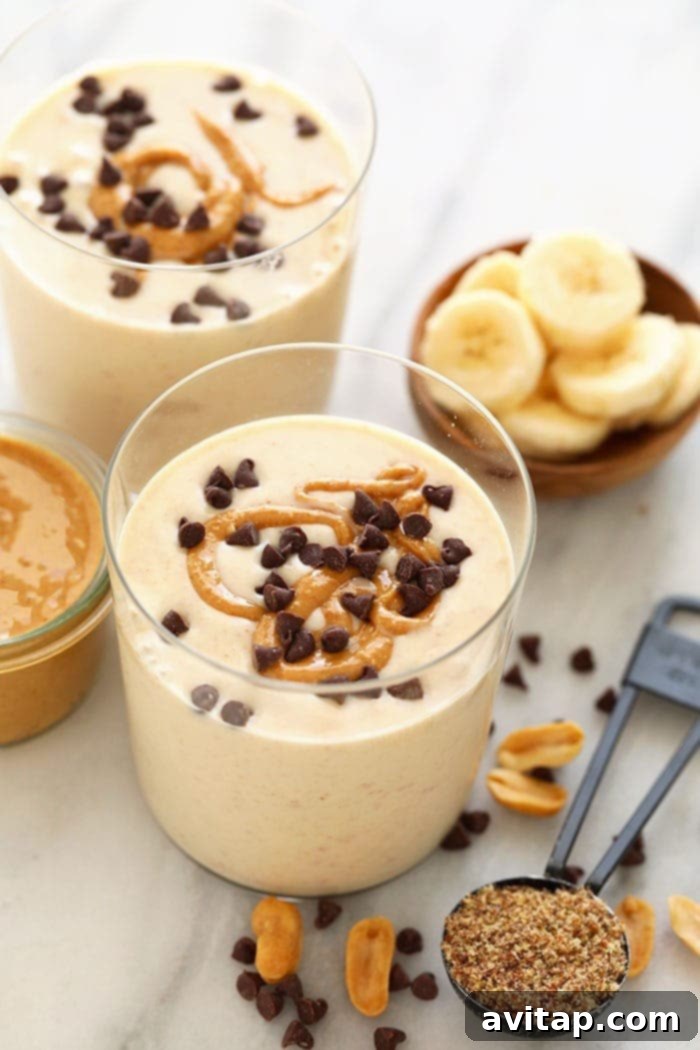 Creamy Peanut Butter Banana Smoothie A vibrant peanut butter banana smoothie served in a tall glass, garnished with a straw and ready to enjoy.
