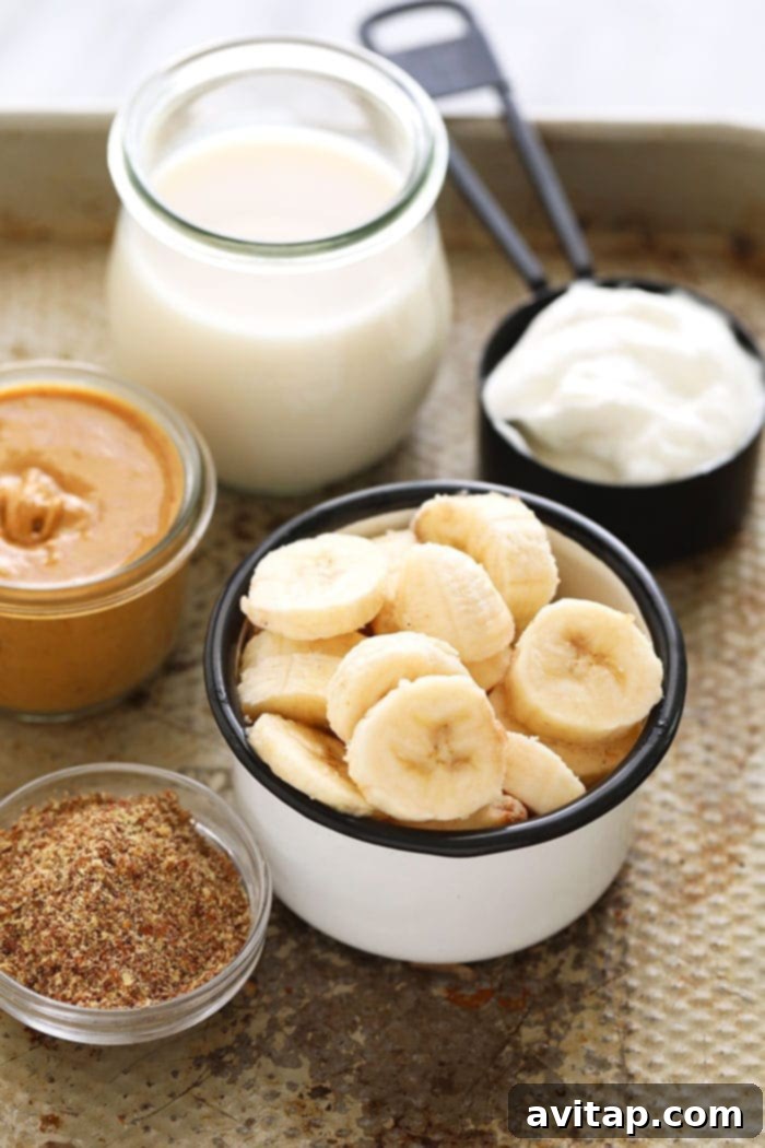 Fresh Ingredients for Smoothie A close-up shot of the fresh ingredients laid out for making the peanut butter banana smoothie.