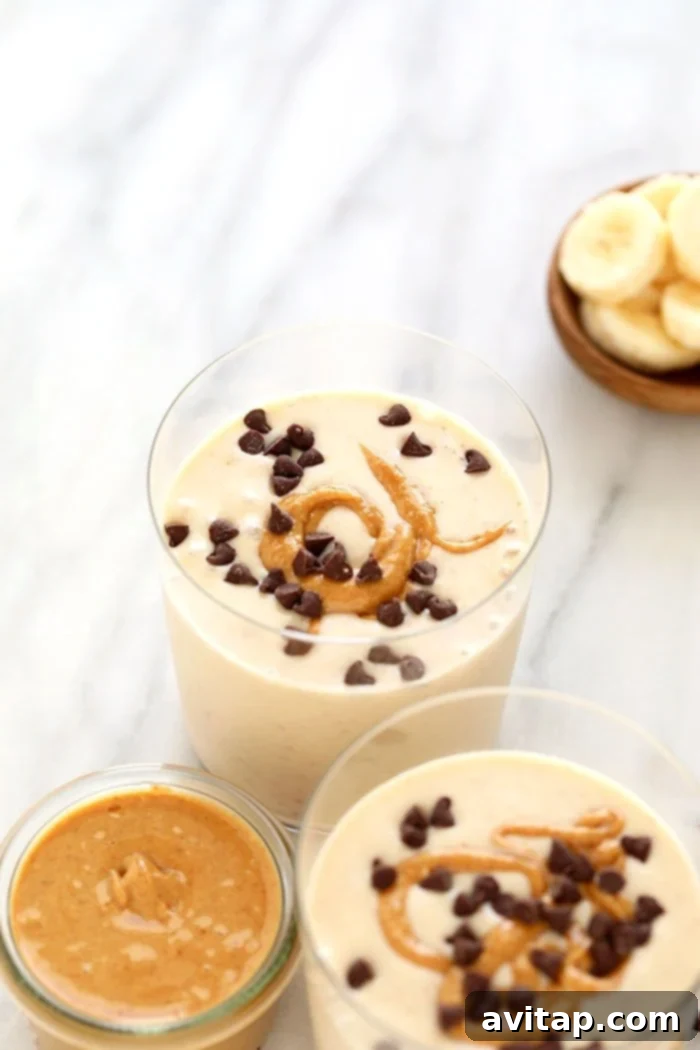 Peanut Butter Banana Smoothie Perfection A refreshing peanut butter banana smoothie presented beautifully in a glass.