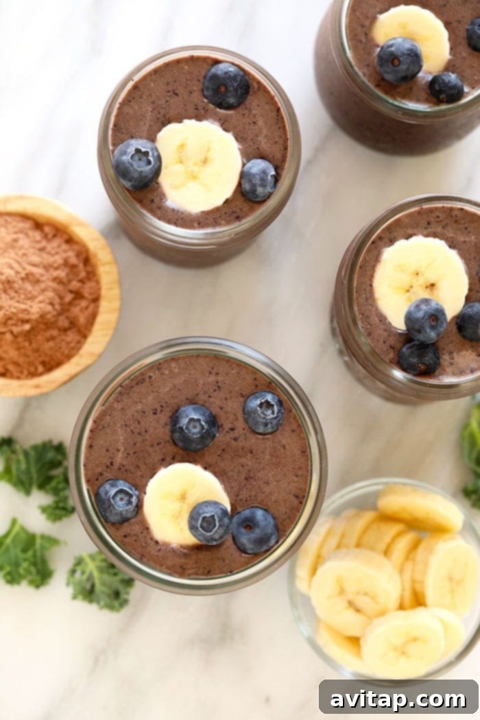 Sharing Superfood Smoothies Two glasses of superfood protein smoothie side by side.
