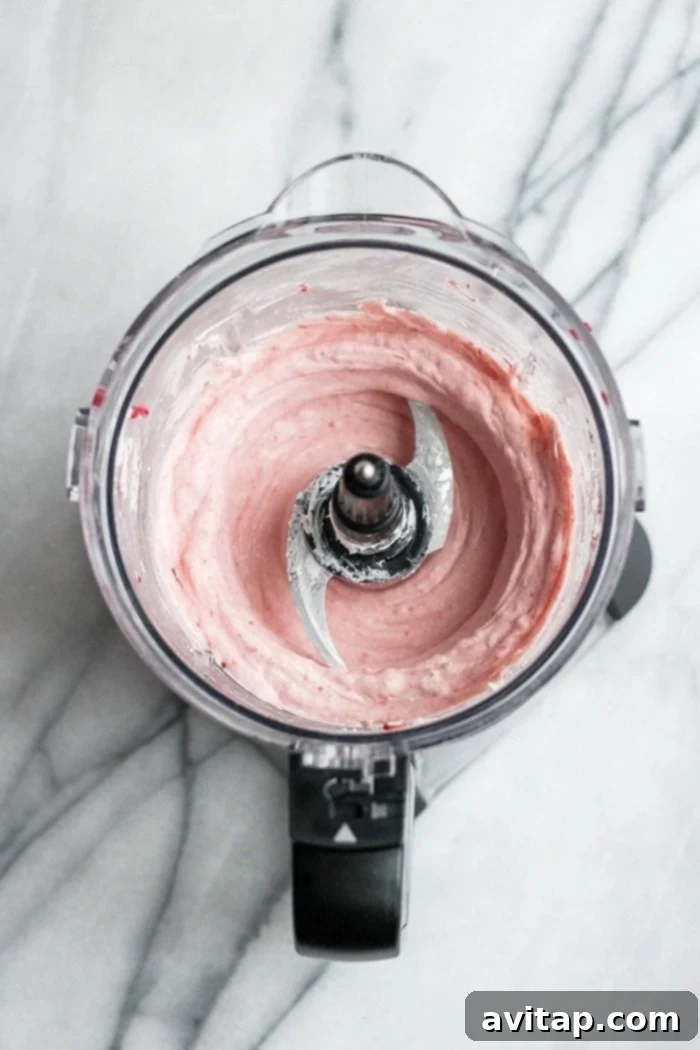 Smooth, creamy fat bomb batter in a food processor bowl