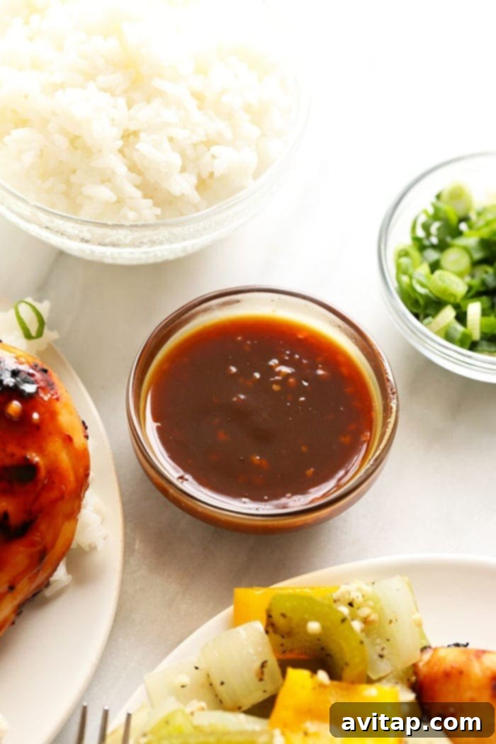 Bowl of Homemade Teriyaki Sauce A bowl of homemade teriyaki sauce, rich and glossy, ready to be used in cooking.