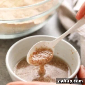 A small bowl containing a thickened flax egg mixture.