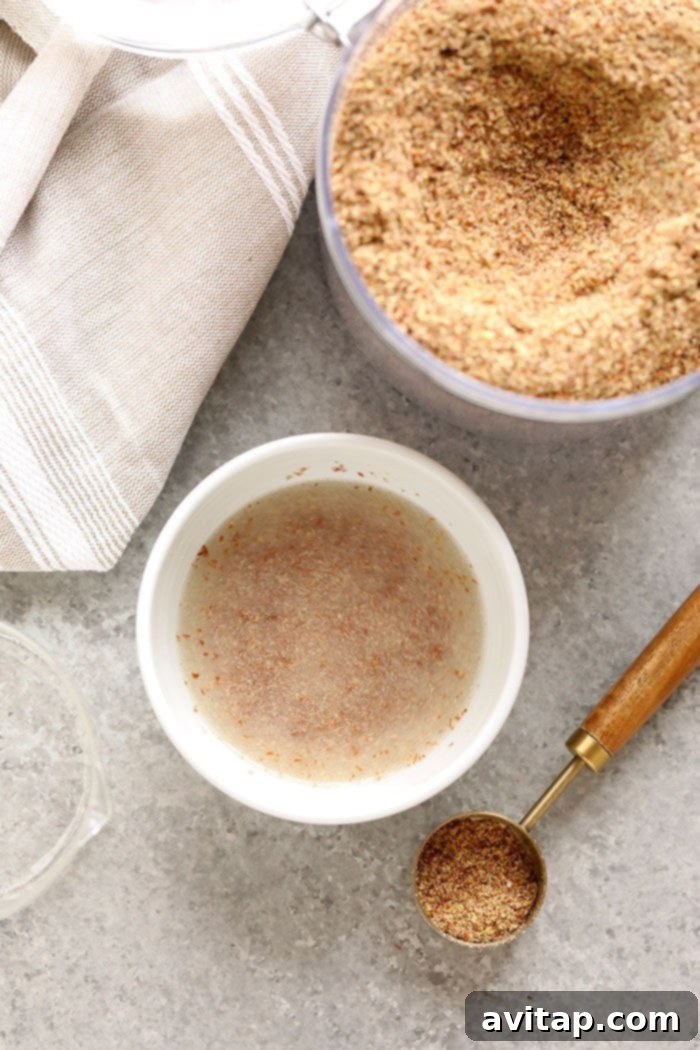 Whip Up a Flax Egg 3 Close-up of finely ground flaxseed meal in a bowl, ready for mixing.