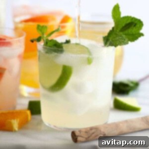 A refreshing vodka lime cocktail garnished with mint leaves.