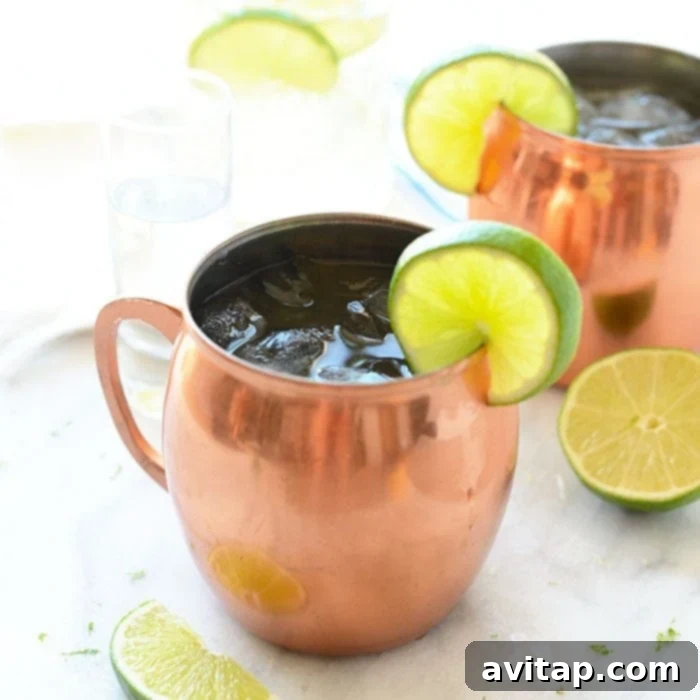 Classic Moscow Mule cocktail in a copper mug with lime garnish