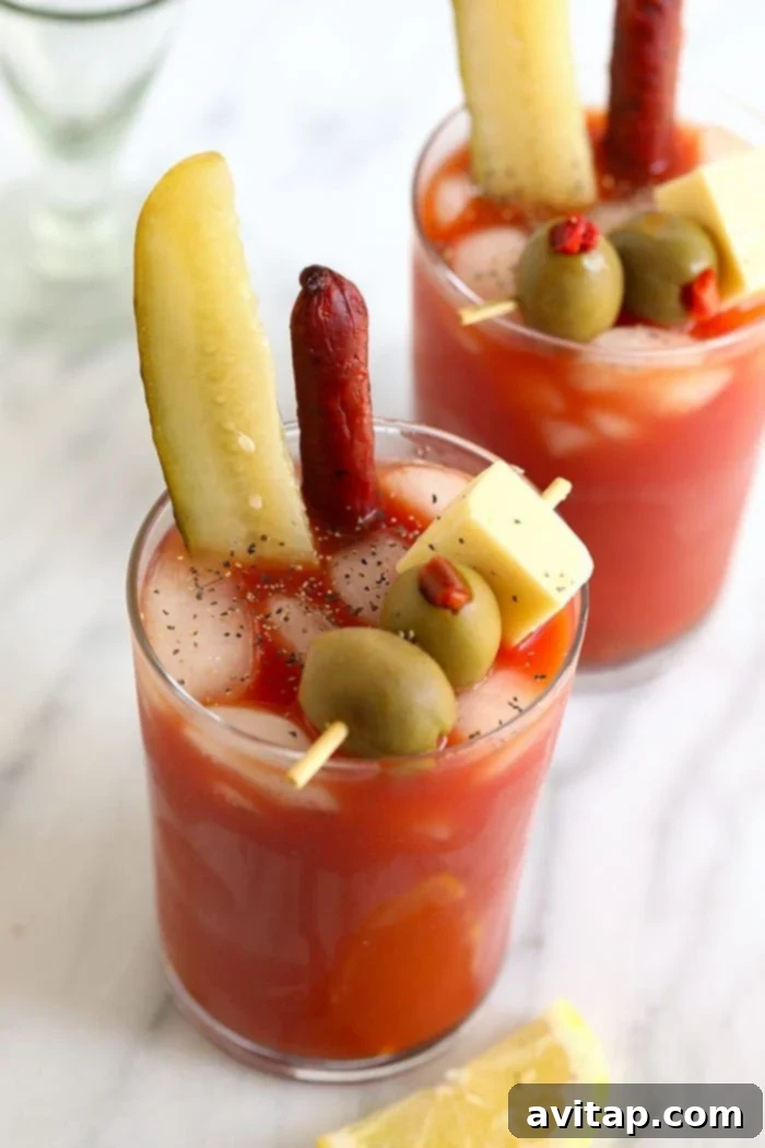 A perfectly garnished Bloody Mary in a tall glass, ready to be enjoyed at brunch