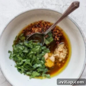 A bowl of grilled shrimp marinade ingredients.
