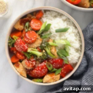 Teriyaki chicken stir fry with vegetables and rice.