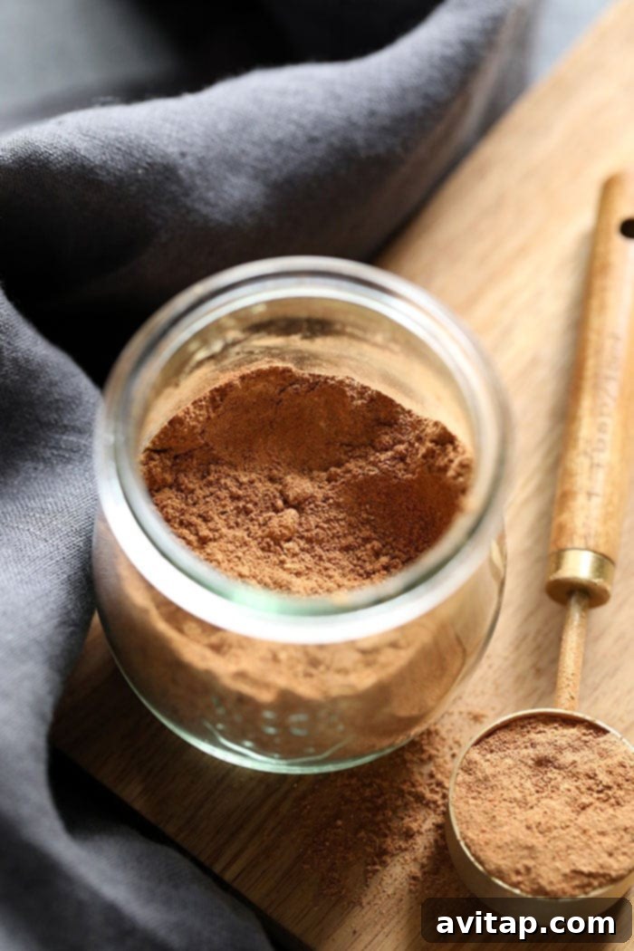Close-up of freshly mixed chai spices, showcasing their vibrant colors and granular texture.
