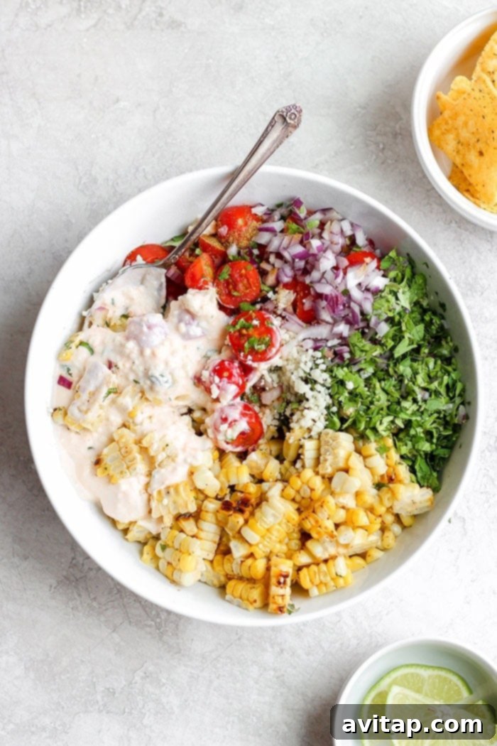 Close-up of a bowl of vibrant Mexican Street Corn Salad.