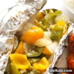 Grilled peppers and onions in a foil pack