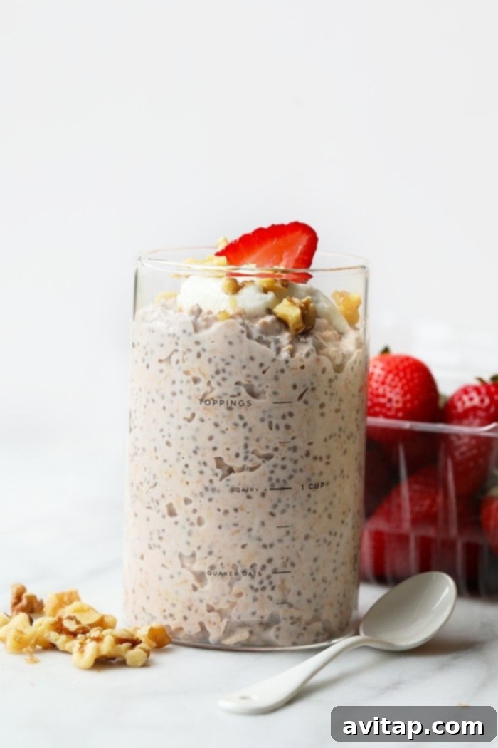Finished vanilla strawberry overnight oats in a jar, ready to eat
