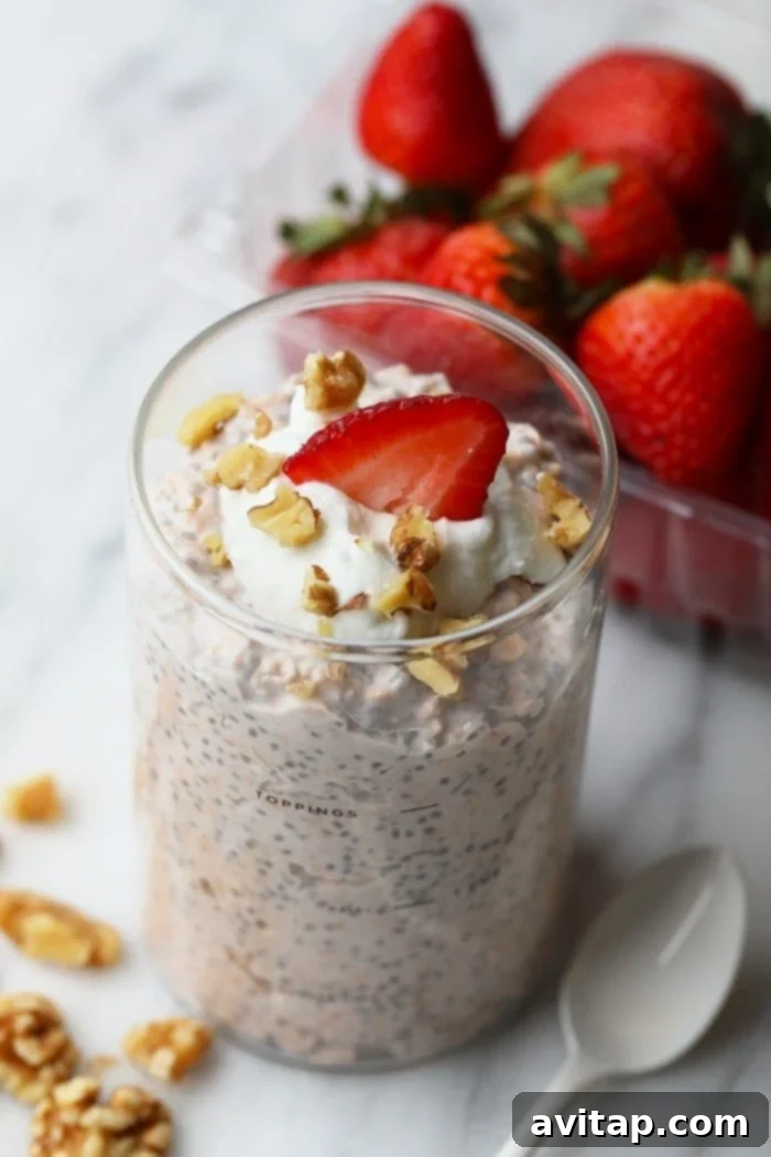 Overnight oats with fresh strawberry and granola toppings