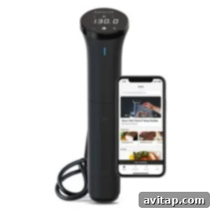 A smartphone displaying a food thermometer app, next to a sous vide immersion circulator.