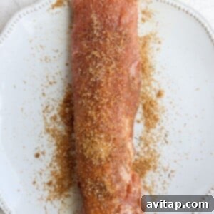 Sous vide pork tenderloin served with spices on a plate.