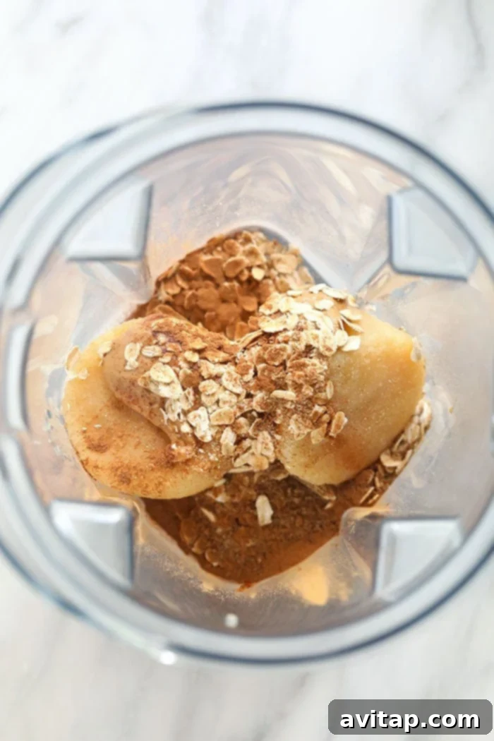 apple smoothie ingredients in a blender
