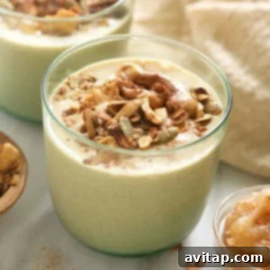 Apple smoothie in a glass.