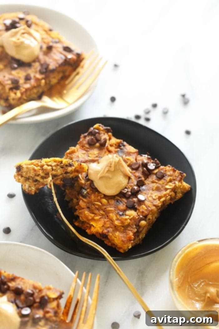 Individual serving of pumpkin baked oatmeal with a swirl of cashew butter