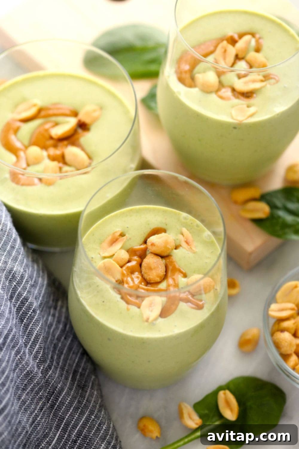 Peanut Butter Green Dream Smoothie 2 Three glasses of Peanut Butter Green Smoothie, ready to drink