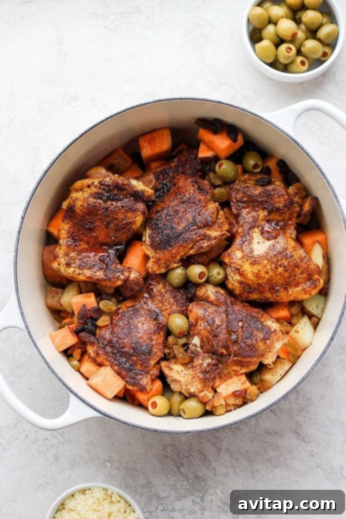 A hearty One-Pot Moroccan Chicken dish simmering perfectly in a beautiful Dutch oven, ready to serve.