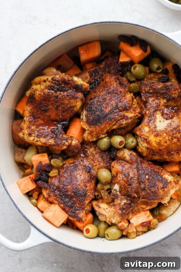The fully cooked One-Pot Moroccan Chicken, rich with spices and vegetables, served directly from the Dutch oven.