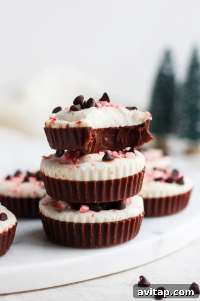 An inviting stack of healthy Peppermint Bark Fat Bombs, perfectly arranged to showcase their irresistible layers and festive appeal, making them an ideal guilt-free holiday dessert.