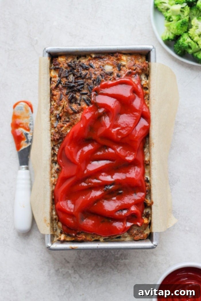 Hearty Wild Rice Meatloaf in a loaf pan, ready for serving