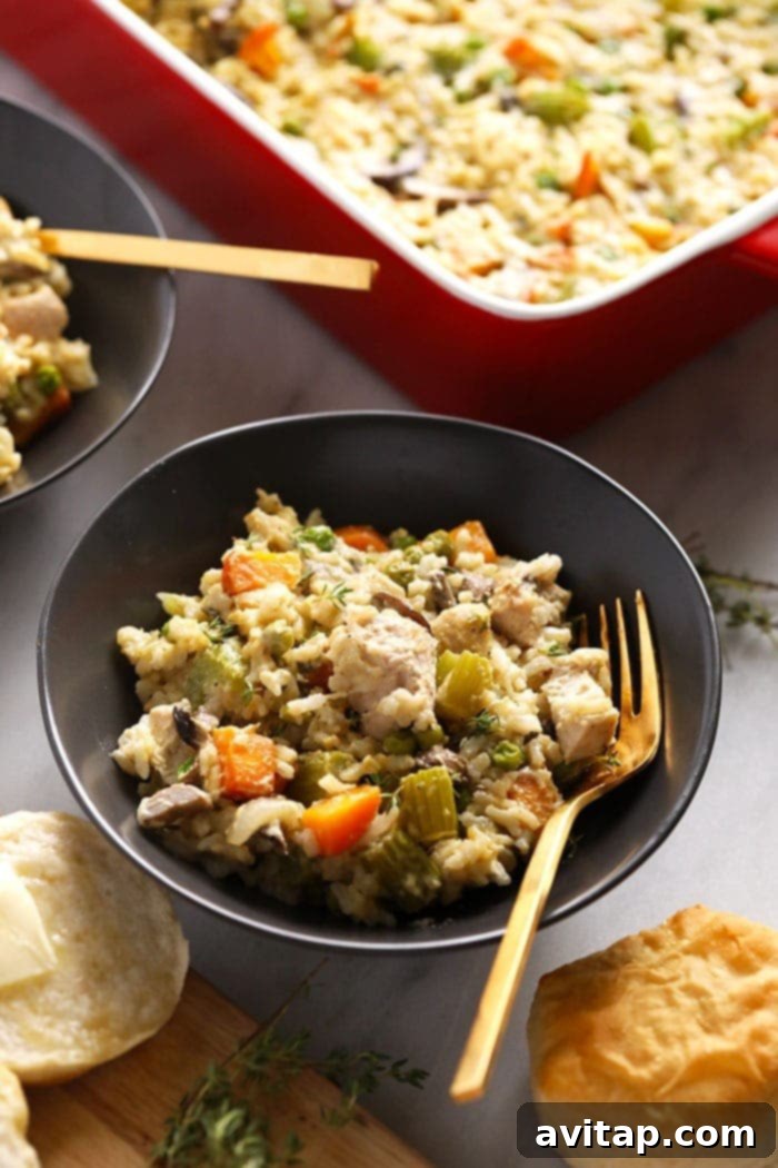 Delicious and healthy Chicken Pot Pie Casserole served in a rustic bowl, showcasing a rich, creamy texture with visible vegetables and chicken.
