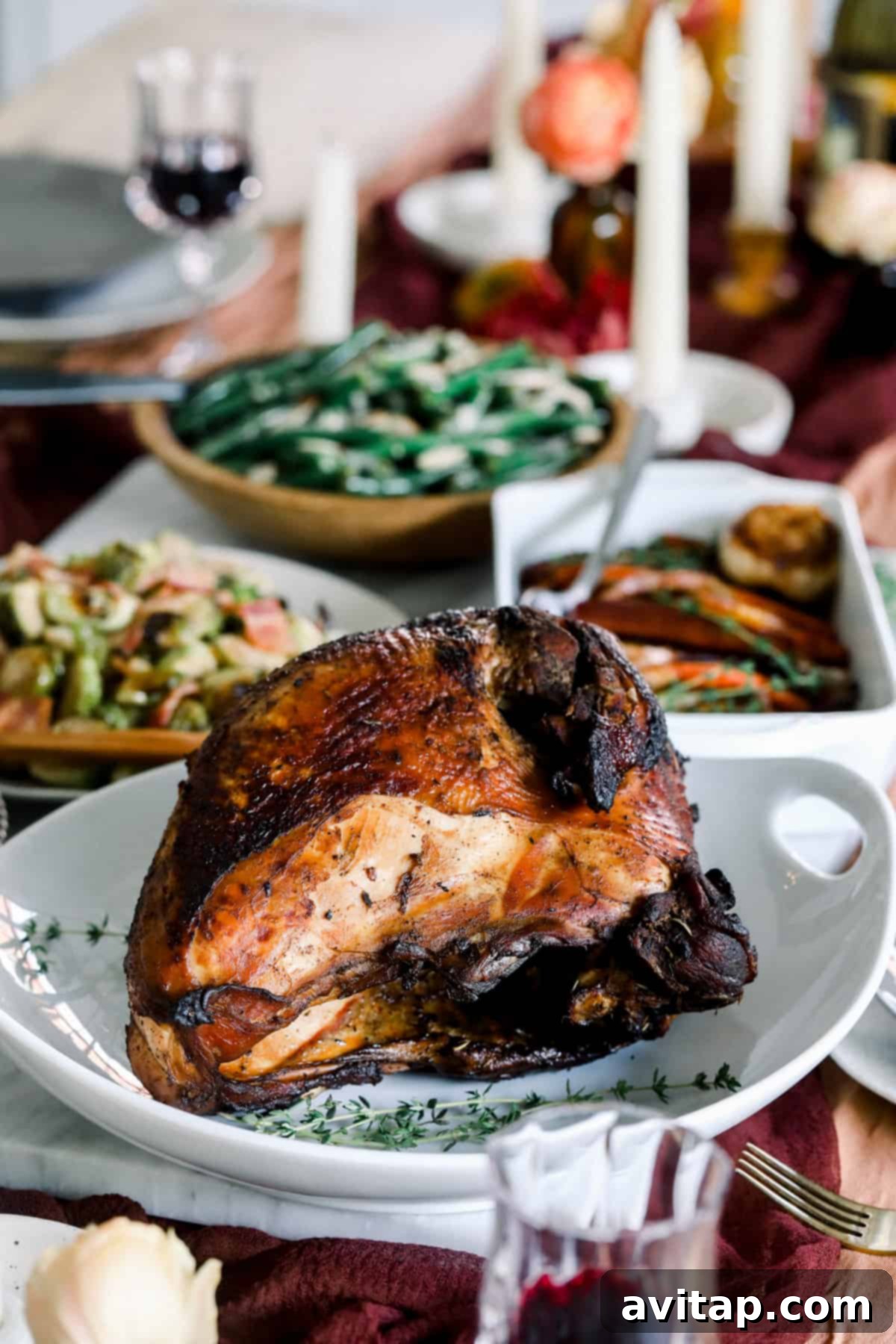 Perfect Sous Vide Turkey 2 A beautifully plated sous vide turkey breast with roasted vegetables, ready to serve.