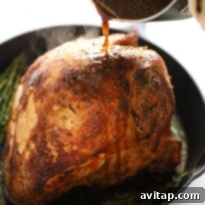 Perfect Sous Vide Turkey 9 A chef pouring a delicious sauce over the roasted sous vide turkey breast.