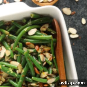 Green Beans Almondine in a casserole dish for the recipe card.