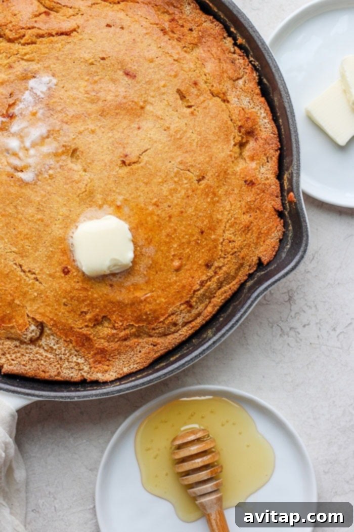 skillet cornbread with melted butter on top