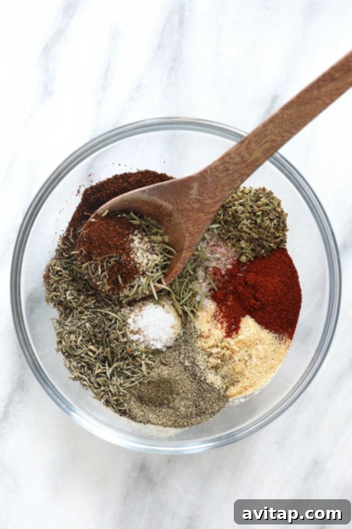 Flavorful turkey seasoning in a rustic bowl, ready for application.
