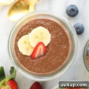 Three jars of protein-packed chia seed pudding with berries and bananas.